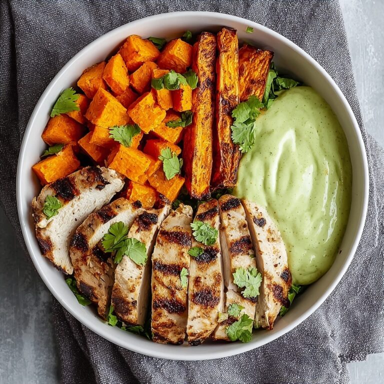 Grilled Chicken Power Bowl with Spiced Sweet Potatoes and Creamy Avocado Sauce Recipe